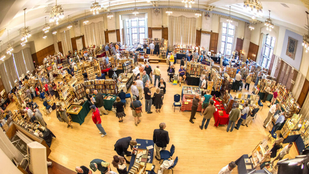 People exploring the Ann Arbor Antiquarian Book Fair.