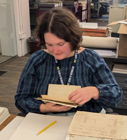 Diana DITL (3) Diana Baxter reading through manuscript materials.