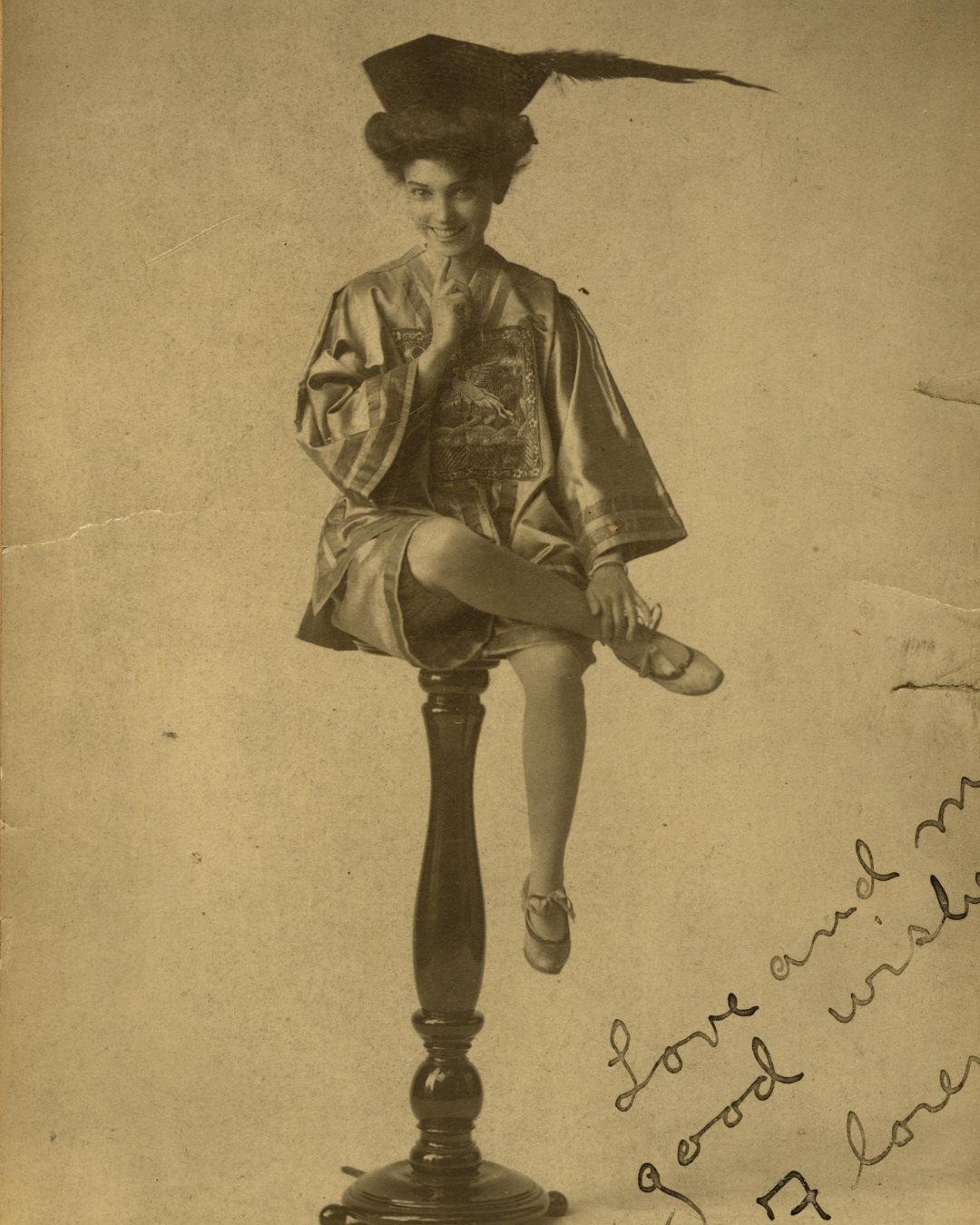 Florence Smith Romaine; San Toy Florence as "San Toy" on top a pedestal. Florence wrote "Love and many good wishes." Captured in 1905.