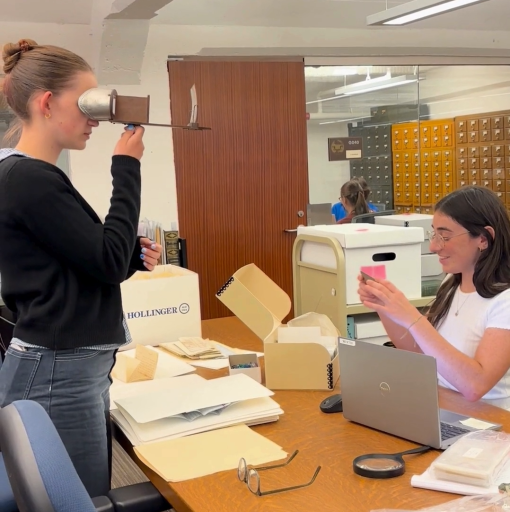 frame-66 Brynne looking at the stereoscopic images Historic Visual Culture Graduate Assistant Ella Brooks-Kamper is working with.