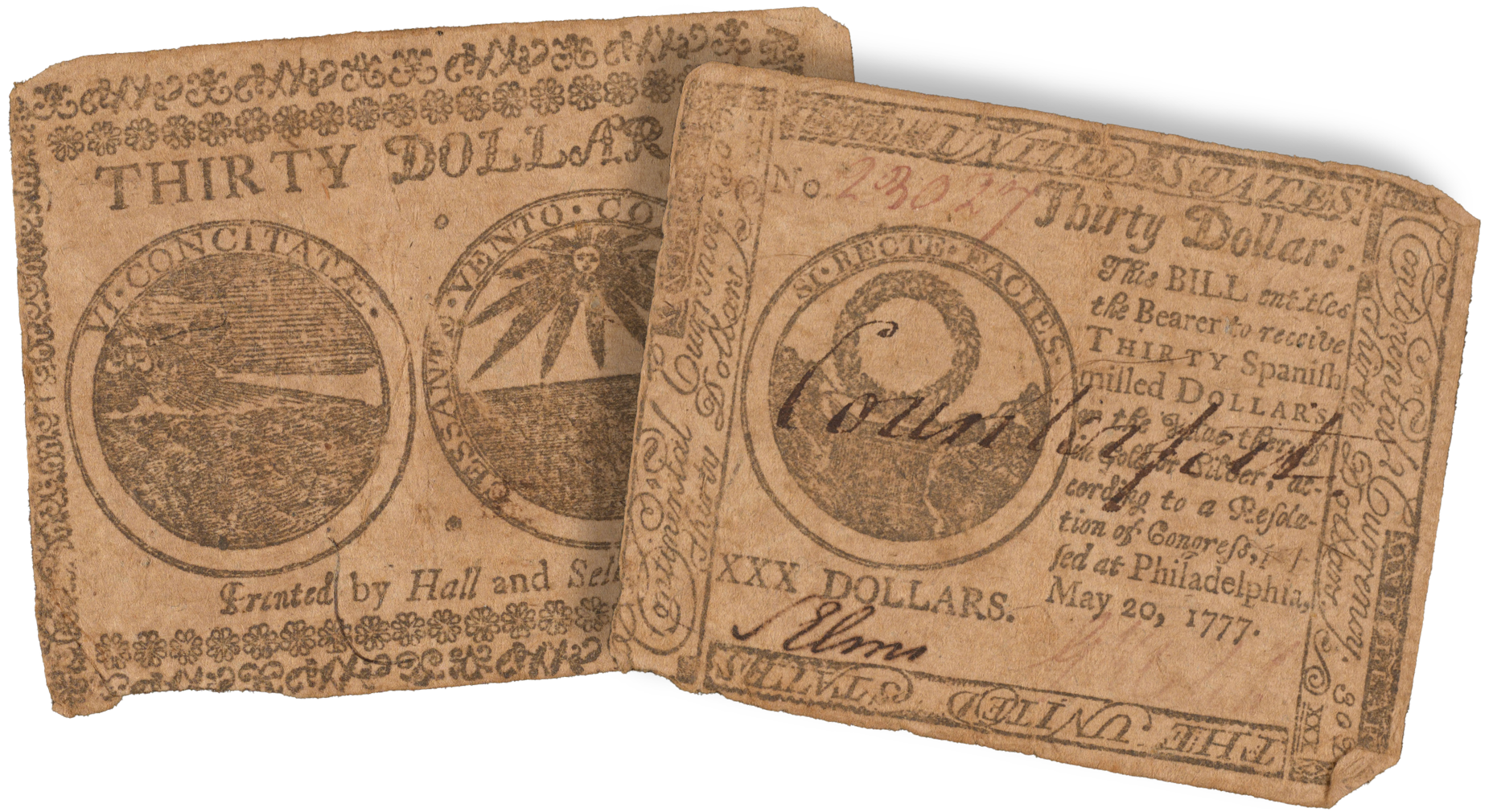 Counterfeit Currency Two examples of counterfeit money, each for $30. One is labelled "Counterfeit" across the money.
